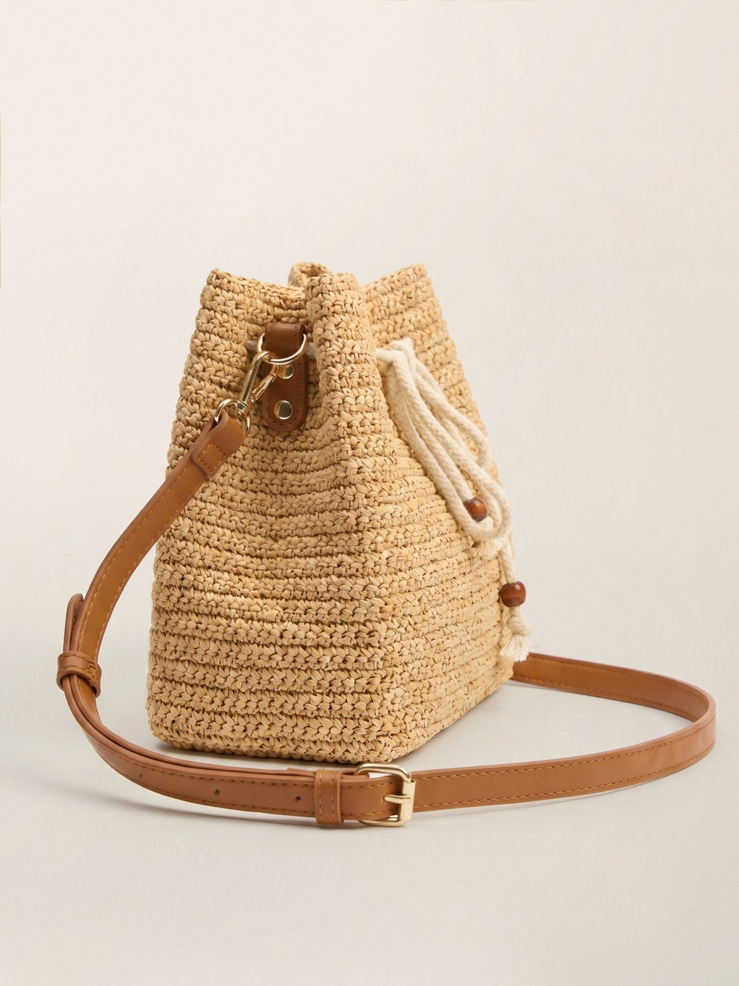 Mini Handwoven Raffia Drawstring Crossbody Bag