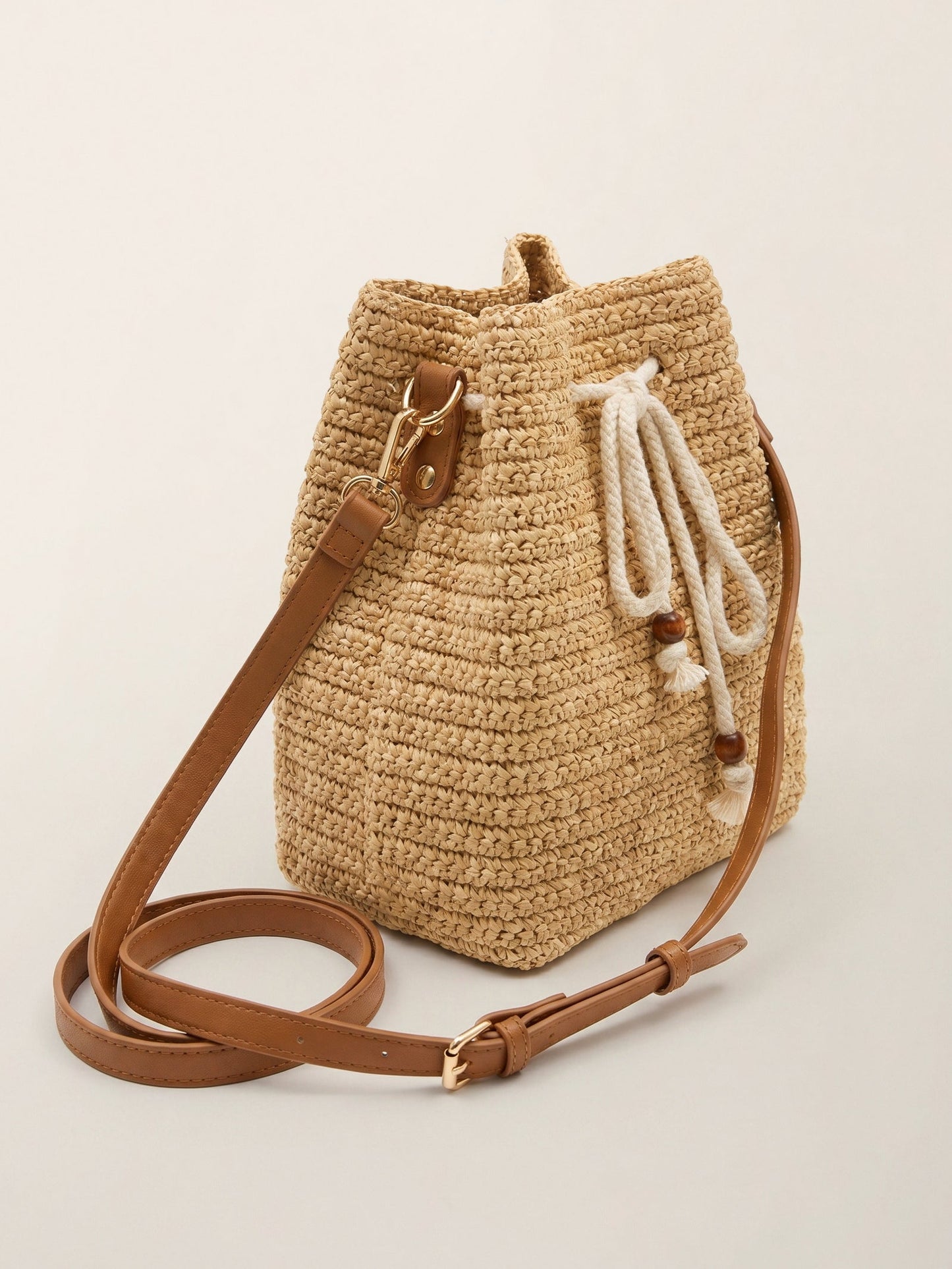 Mini Handwoven Raffia Drawstring Crossbody Bag