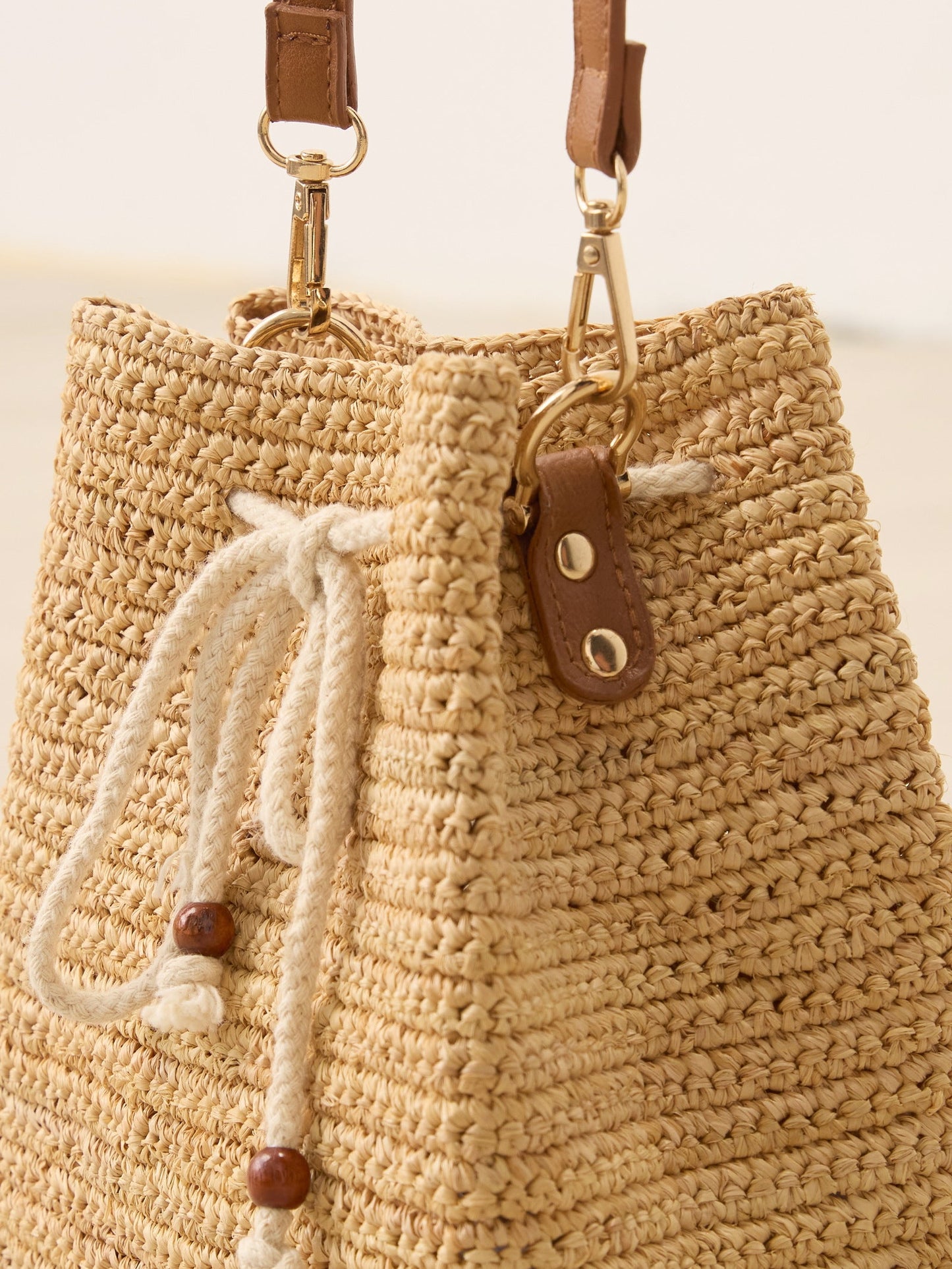 Mini Handwoven Raffia Drawstring Crossbody Bag