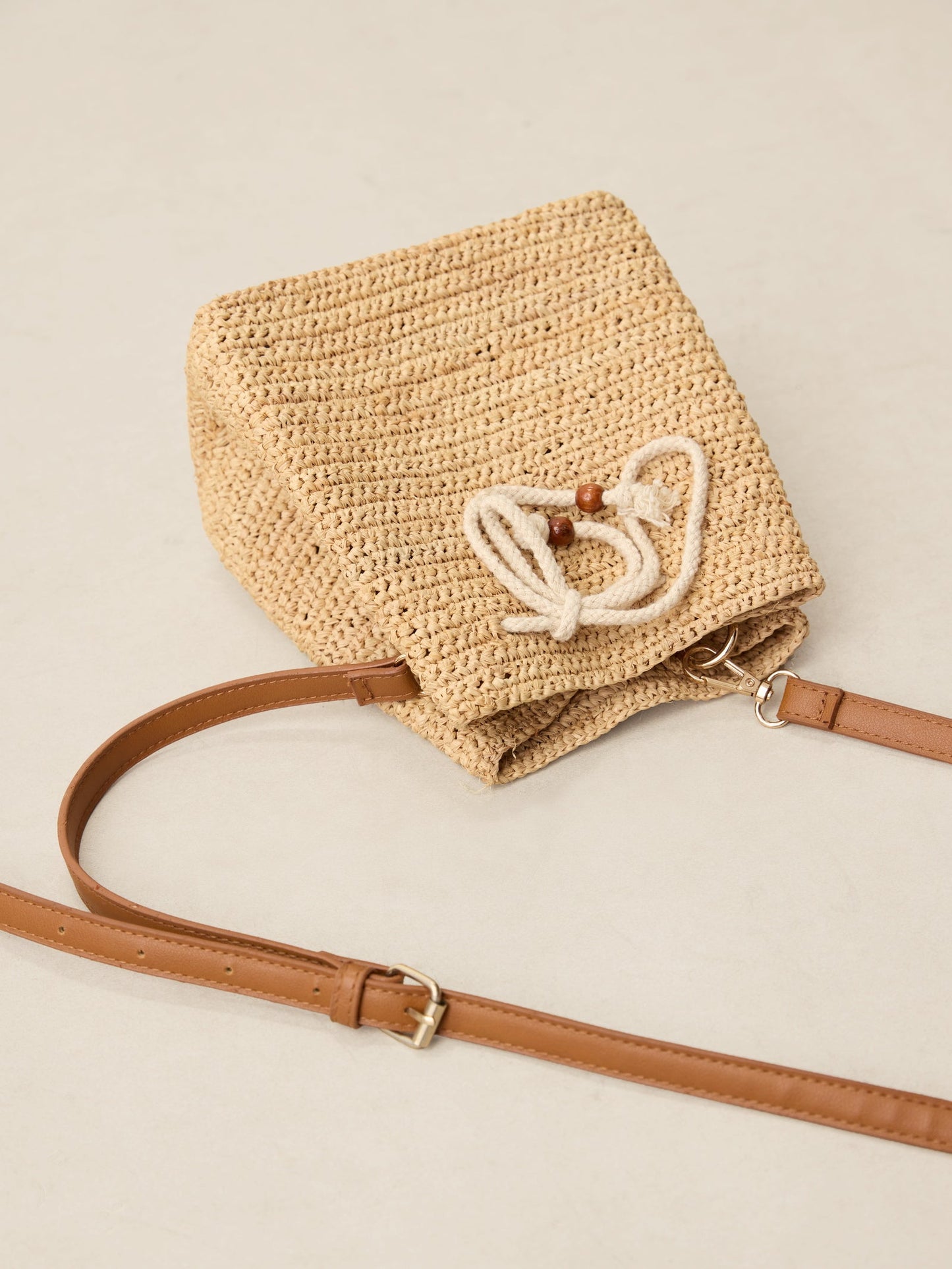 Mini Handwoven Raffia Drawstring Crossbody Bag